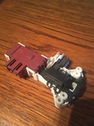 Blokada otwarcia drzwi do pralki Amica.