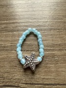 Pierścionek z koralików szklanych gwiazda