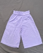 Dziewczęce spodnie z szerokimi nogawkami Sinsay rozmiar 104