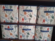 Pudełka na zabawki dinozaury