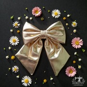 Elegancka złota kokarda do włosów spinka