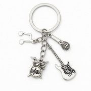 Brelok muzyczny – gitara, mikrofon, nutki, perkusja