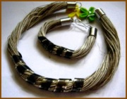 Len i mosiądz, biżuteria w stylu art nouveau, naszyjnik i bransoletka