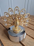 Pozłacana pozytywka paw nowa