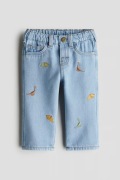 H&M Nowe spodnie / jeansy z dinozaury r. 86 / 12-18 m
