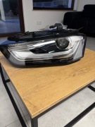 Reflektor przedni LEWY Audi A4 B8 Lift 