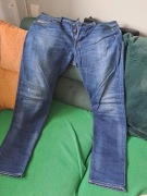 Diesel BUSTER REGULAR SLIM TAPERED jeansy męskie proste rozmiar 33/32
