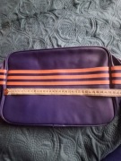  Torebka adidas na laptop. 
