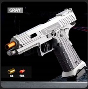 ZABAWKOWY PISTOLET FIDGET TOY REPLIKA REALISTYCZNY FIDGET TOY Z STRZAŁKAMI