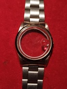 Koperta od zegarka z uszkodzoną bransoletką i bez dekielka