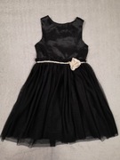 Czarna elegancka sukienka tiulowa z kwiatkiem H&M ok. 122 - 128