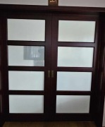 Drzwi drewniane przesuwane przeszklone bez framugi