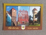 Góra: Wieża Głogowska , wieża ciśnień, herb 