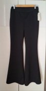 Czarne spodnie dzwony masełko