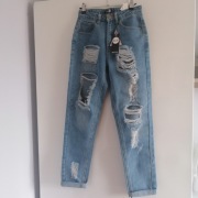 Spodnie damskie. Jeansy  niebieskie, dziury 36 FR, 34 DE