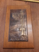Plakietka pamiątkowa "Koszalin", blacha miedziana na drewnie