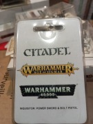 Inquisitor with power sword and bolt pistol