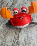 Chodzacy raczek grajacy. Zabawka interaktywna