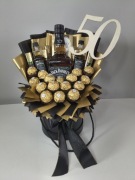 Box prezentowy na 50 urodziny słodycze Ferrero Merci elegancki czarno złoty