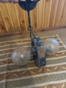 lampa wisząca  drewnian z kutymi elementami