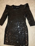 Sukienka z cekinami.