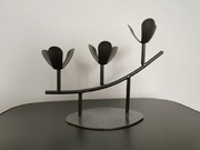 Oryginalny świecznik metalowy kwiatki