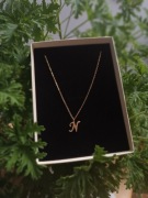 Naszyjnik literka ze stali chirurgicznej 