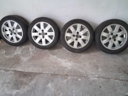 Oryginale alufelgi Nissan R16x7J ET40 z oponami letnimi 205/50 ponad 6mm