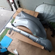 Peugeot Partner2011błotnik prawy +spoiler