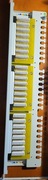 Schrack Patchpanel 19" 24xRJ45 nieekranowany Cat.6, 1U, RAL7035