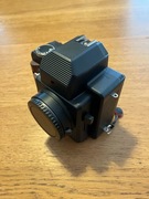 Nons SL660 (instax), mocowanie EF, obiektywy 50/1.8 oraz 35/2.4