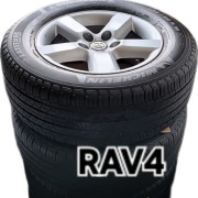 TOYOTA RAV4 II Oryginalne alufelgi 16" z oponami Michellin i nakrętki.