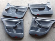 Boczki tapicerki drzwi komplet Golf V kombi 
