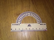 Kątomierz szkolny 180 stopni plastikowy PZPT Paczków 10cm PRL