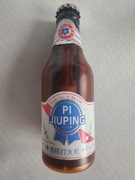 Zapalniczka Kolekcjonerska butelka z otwieraczem . 