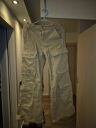 Spodnie kobiece cargo, dzwony Divided rozmiar 32