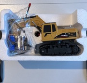 Zdalnie sterowana zabawka – koparka gąsienicowa marki Power,