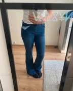 jeansy dzwony granatowe z szerokimi nogawkami