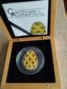 Numizmat z serii jajo cesarskie  o wartości 5 dolarów.