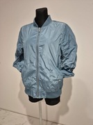 Niebieska kurtka wiatrówka mieniąca Jyothi