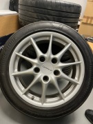 Felgi z oponami PORSCHE 911 17 CALI 7J ET50 9J ET55