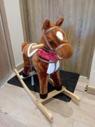 Koń, Konik na biegunach sprawny do poprawek, rusza ogonem i pyskiem, muzyka