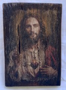 Grafika na starej desce sosnowej.