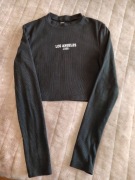 Elegancka  damska bluzka z długim rękawem S.