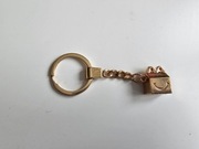 Breloczek McDonalds kolor złoty kształt zestaw Happy Meal