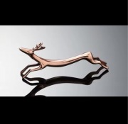 Jelonek jeleń figurka podstawka pod sztućce metalowy złoty na stół podpórka