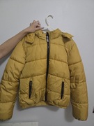 Puchowa musztardowa kurtka pikowana 