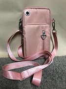 Torebka etui na portfel, telefon w kolorze pudrowy róż