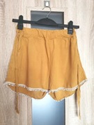 Musztardowe zwiewne krótkie spodenki rozmiar M/L