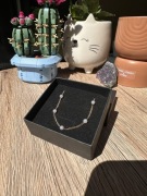 Złoty naszyjnik z perełkami koralikami stal